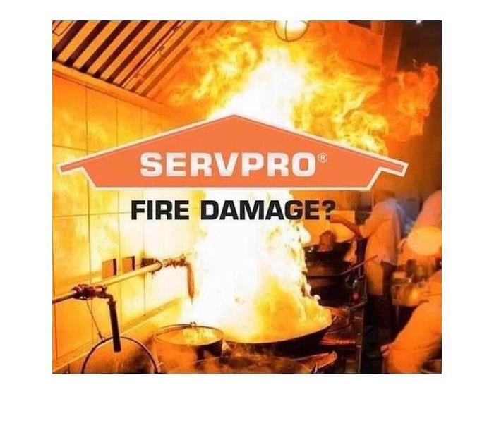 Fire burning inside of an office - Servpro logo in the middle