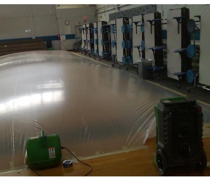 Gym floor with drying equipment