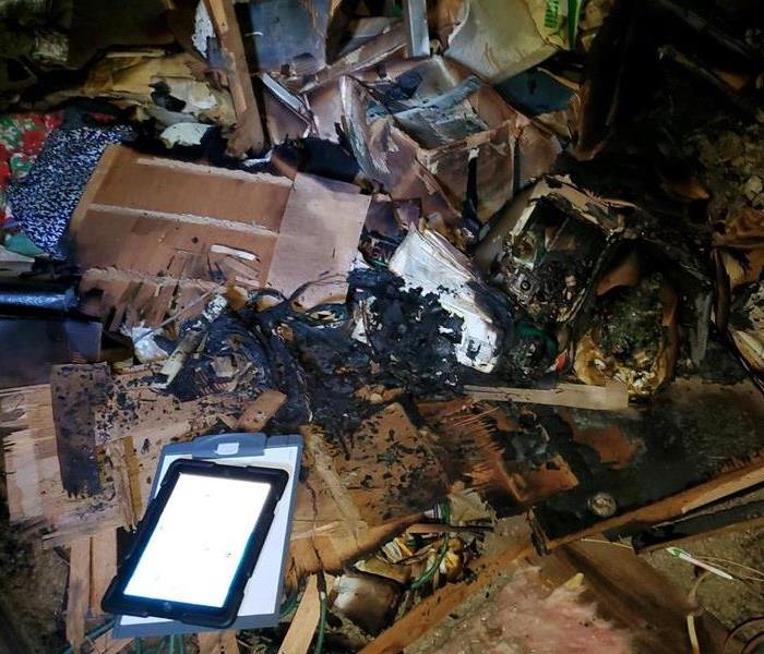 Contents in a home that have been affected by fire, and smoke damage