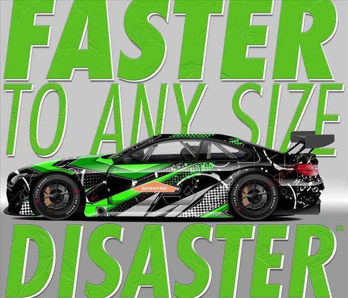 SERVPRO Logo Fast To Any Size Disaster with a NASCAR black vehicle